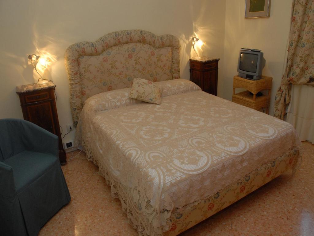 Postel nebo postele na pokoji v ubytování Casa Rachele