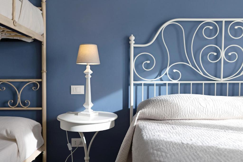 Ένα ή περισσότερα κρεβάτια σε δωμάτιο στο Victoria Apartments Lucus Bormani