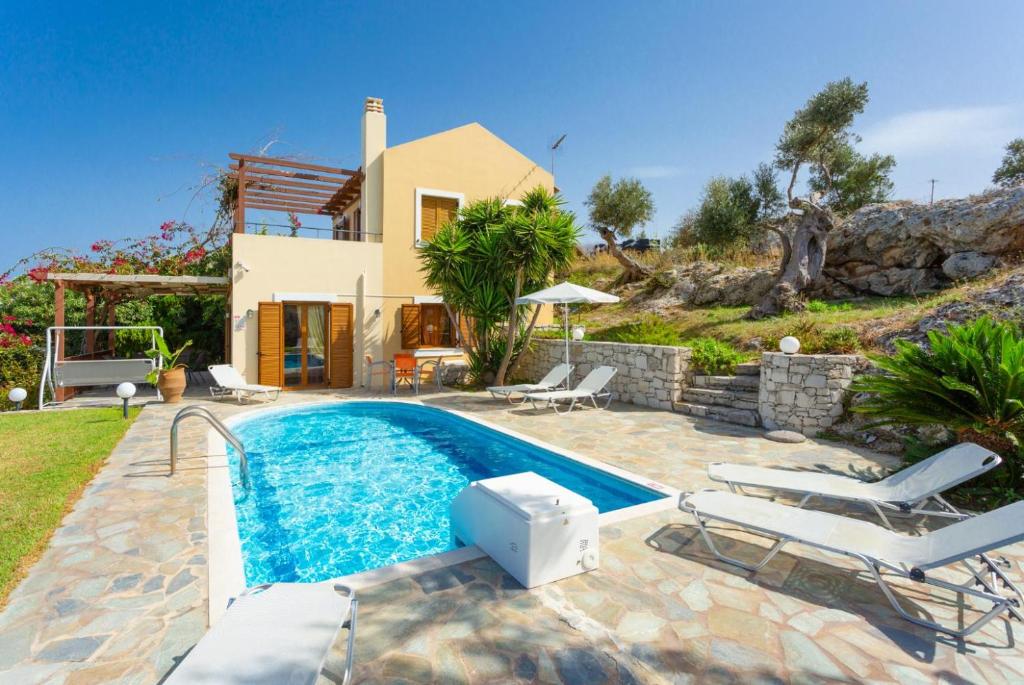 The swimming pool at or close to Villa Garifallia