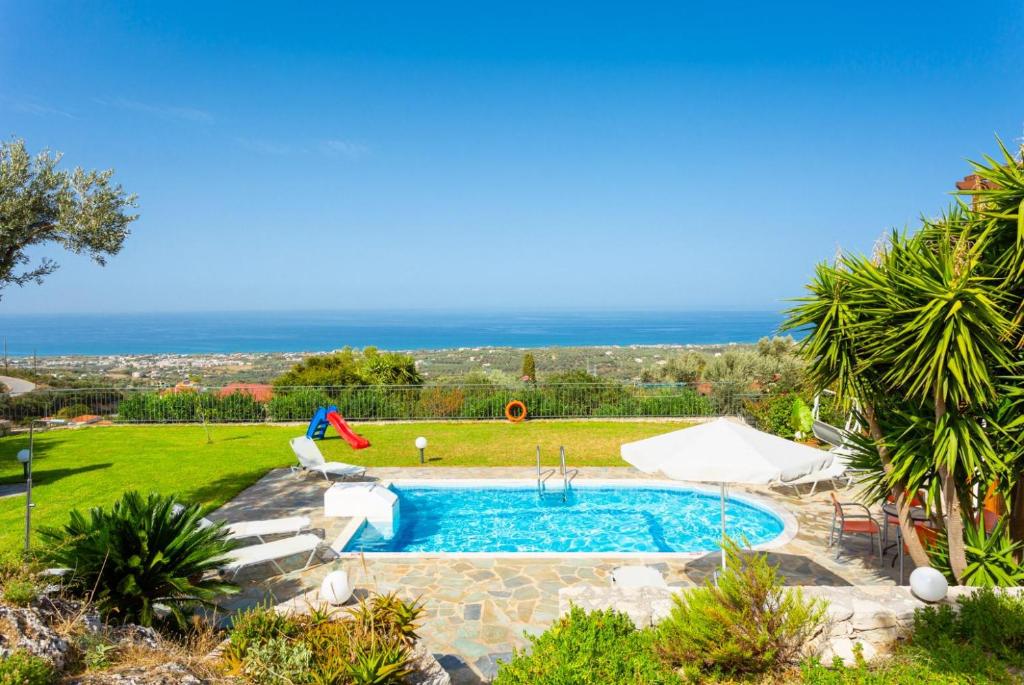 The swimming pool at or close to Villa Garifallia