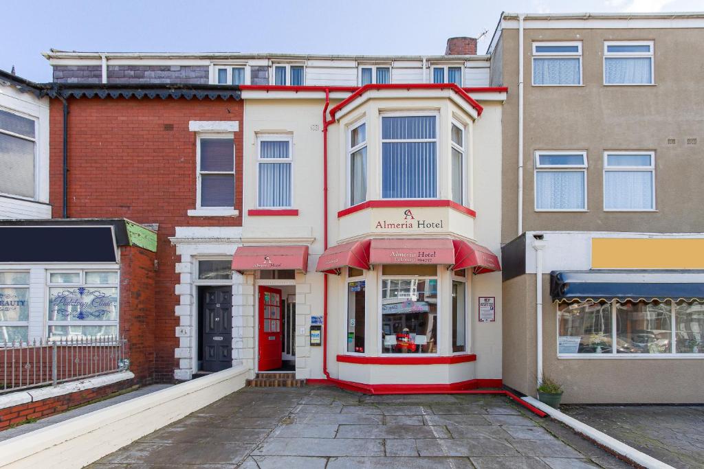 an empty street in front of a building at The Almeria in Blackpool