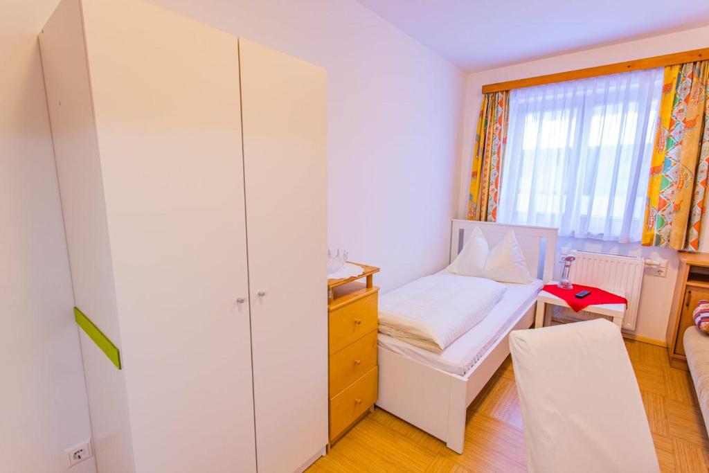 Postel nebo postele na pokoji v ubytování Landhaus Tritscher