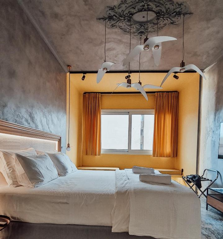 Postel nebo postele na pokoji v ubytování La mouette apartment,Plaka, Athens