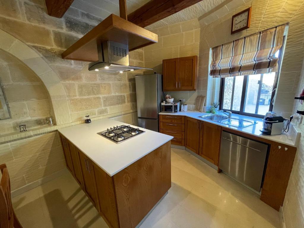 Kuchyň nebo kuchyňský kout v ubytování Gilju B&B