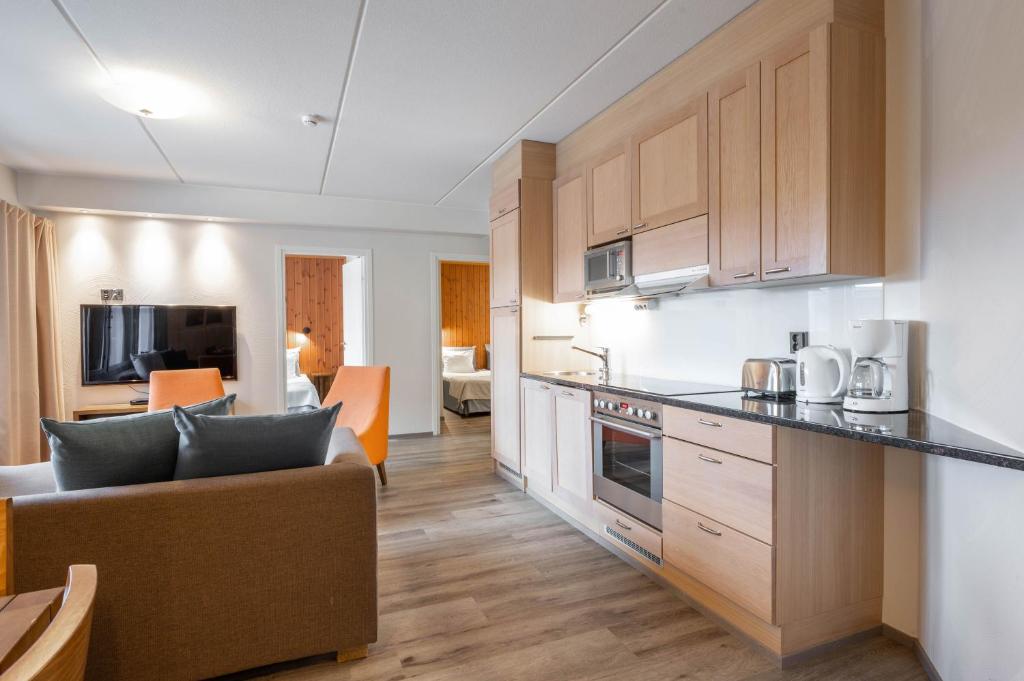 Kuchyň nebo kuchyňský kout v ubytování Ski-Inn RukaVillage