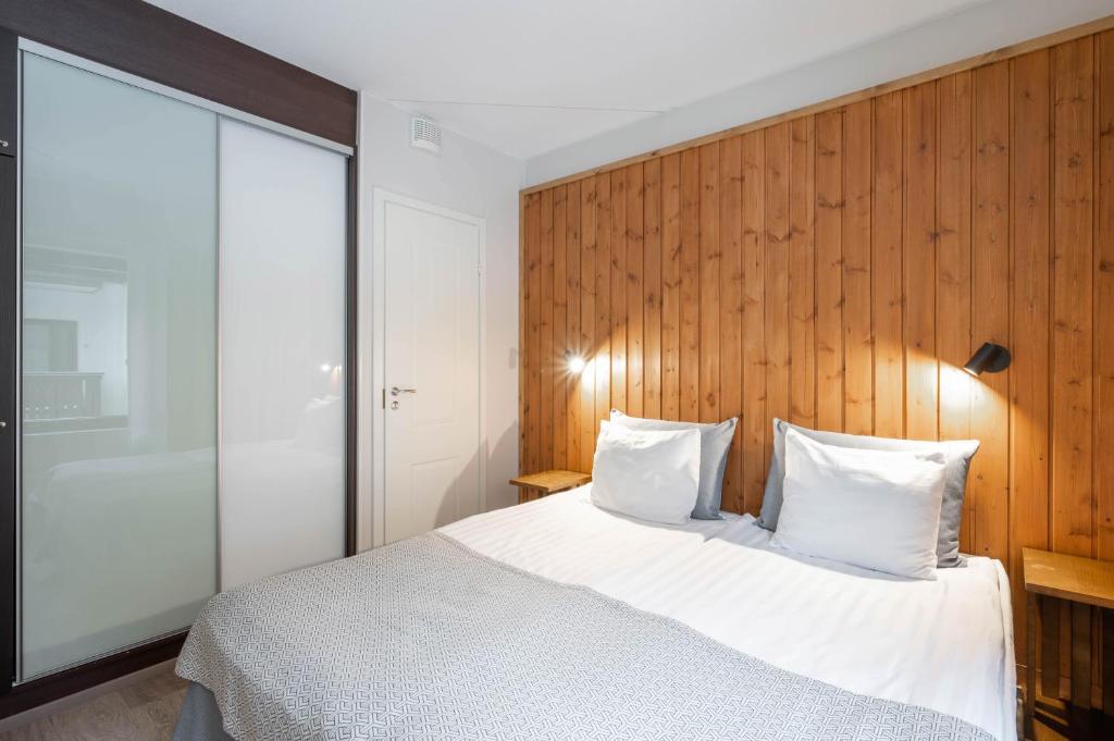 Postel nebo postele na pokoji v ubytování Ski-Inn RukaVillage