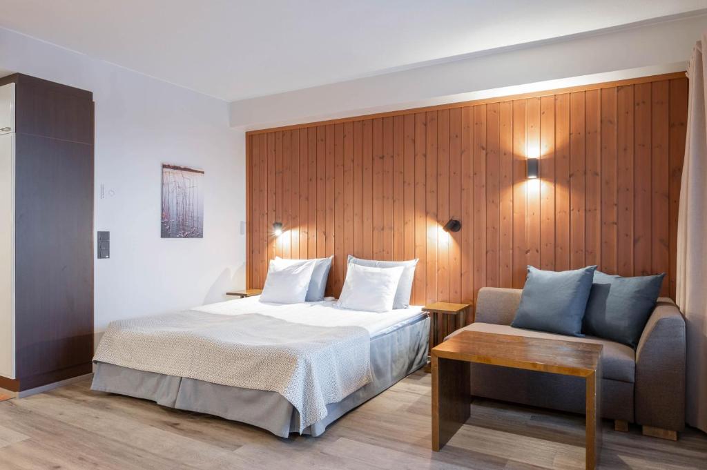 Postel nebo postele na pokoji v ubytování Ski-Inn RukaVillage