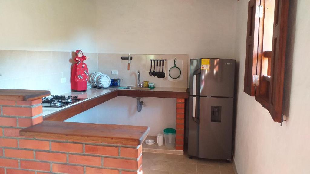 Kuchyň nebo kuchyňský kout v ubytování Posada Villa Paula