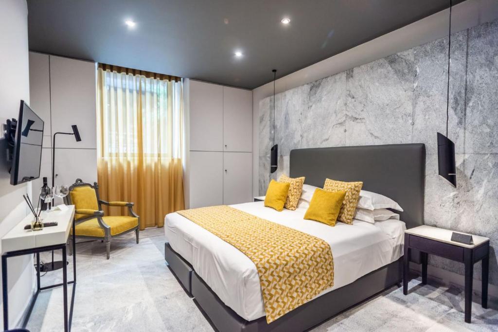 Posteľ alebo postele v izbe v ubytovaní 33SolonosSuites