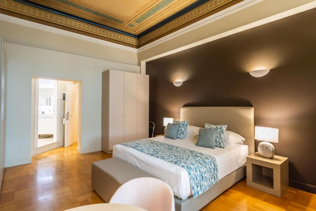 Posteľ alebo postele v izbe v ubytovaní 33SolonosSuites
