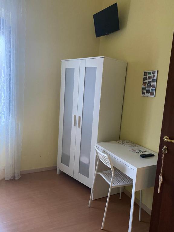Televízia a/alebo spoločenská miestnosť v ubytovaní La Foresteria