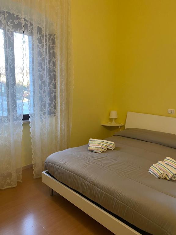Posteľ alebo postele v izbe v ubytovaní La Foresteria