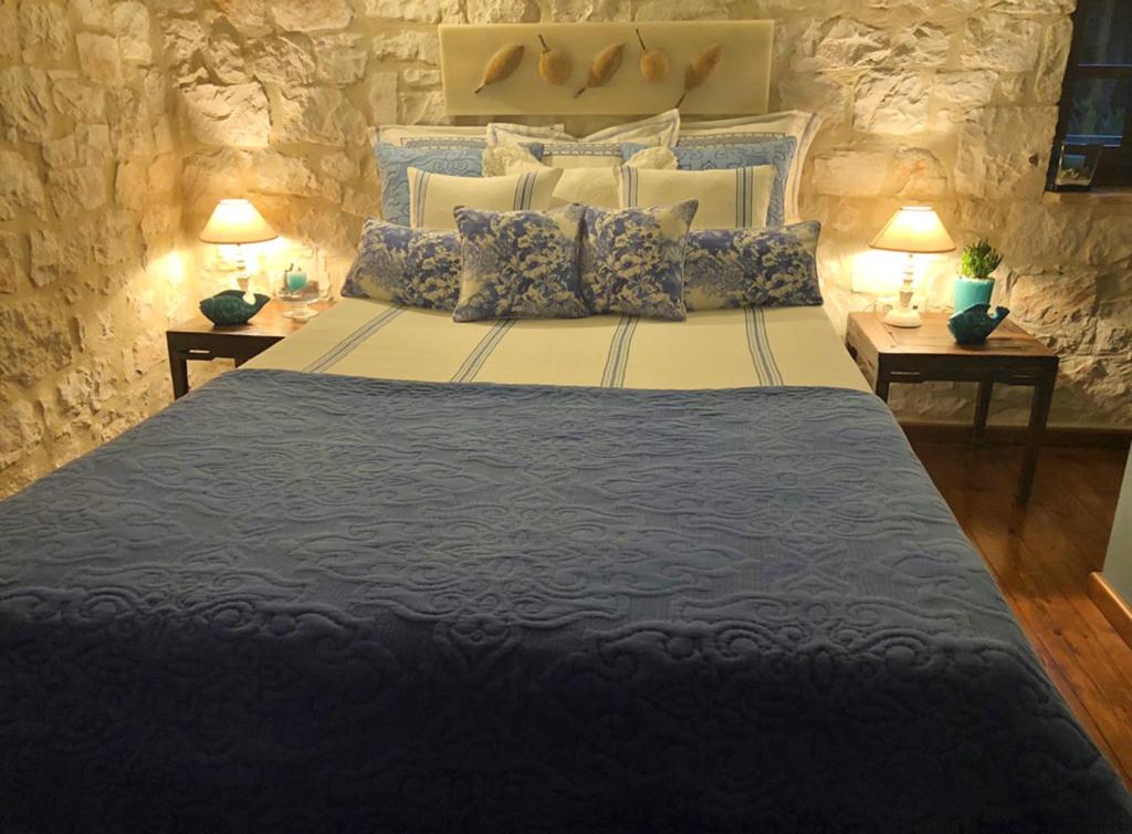 Posteľ alebo postele v izbe v ubytovaní Lalla Private Luxury Villa