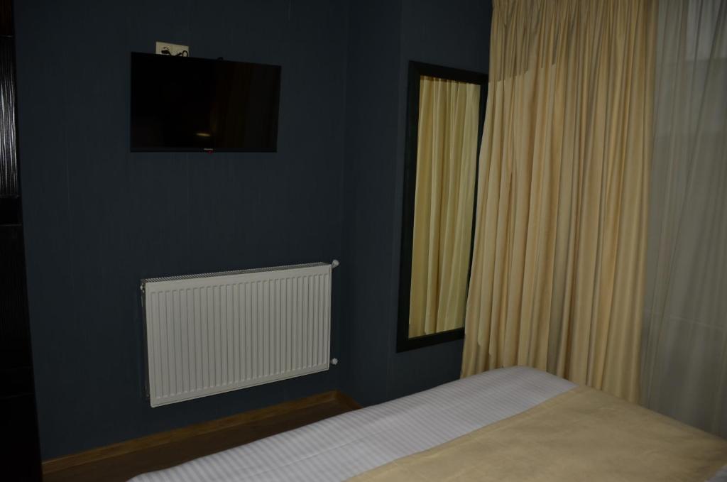 Postel nebo postele na pokoji v ubytování Vere Corner Hotel