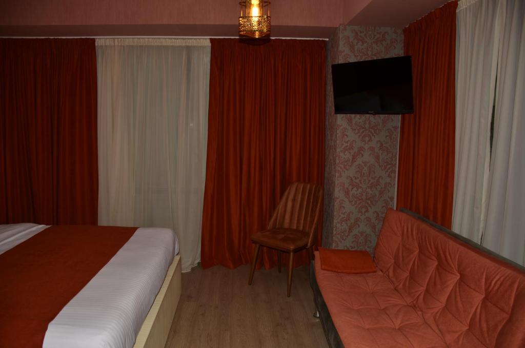 Postel nebo postele na pokoji v ubytování Vere Corner Hotel