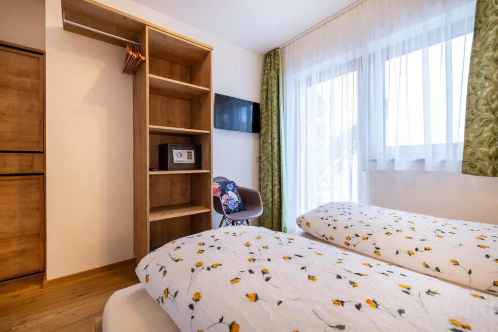 Posteľ alebo postele v izbe v ubytovaní WiWa Appartement