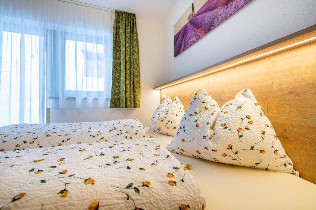 Posteľ alebo postele v izbe v ubytovaní WiWa Appartement