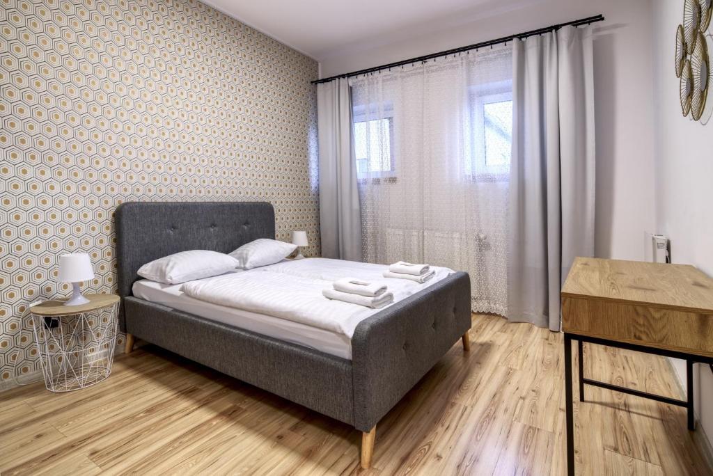 Posteľ alebo postele v izbe v ubytovaní Noclegi Stop and Sleep Zgorzelec