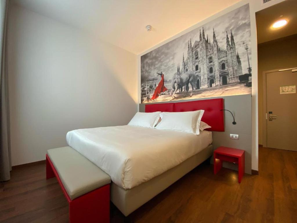 Ein Bett oder Betten in einem Zimmer der Unterkunft AMEDIA Hotel Milano