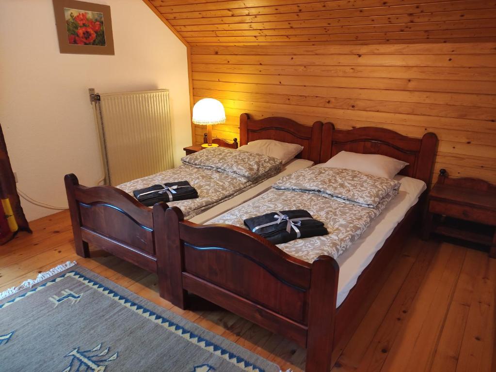 Postel nebo postele na pokoji v ubytování Alp House