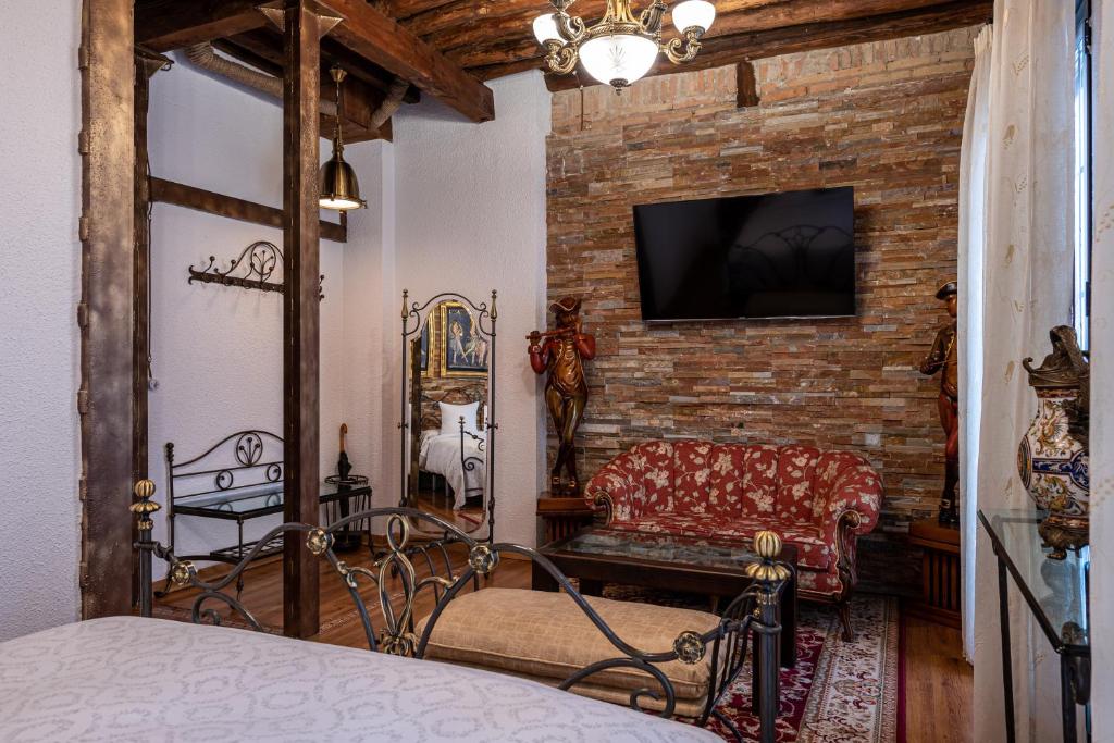 TV a/nebo společenská místnost v ubytování Casa de Reyes