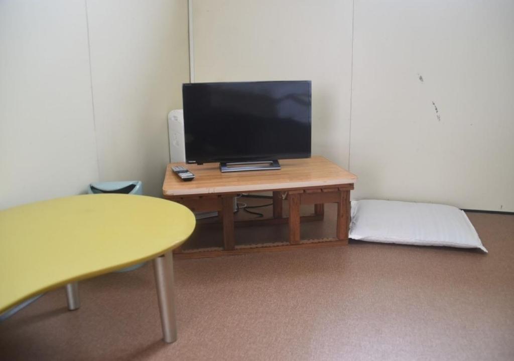 Televízia a/alebo spoločenská miestnosť v ubytovaní Guest House Minatoya Tokunoshima - Vacation STAY 01034v