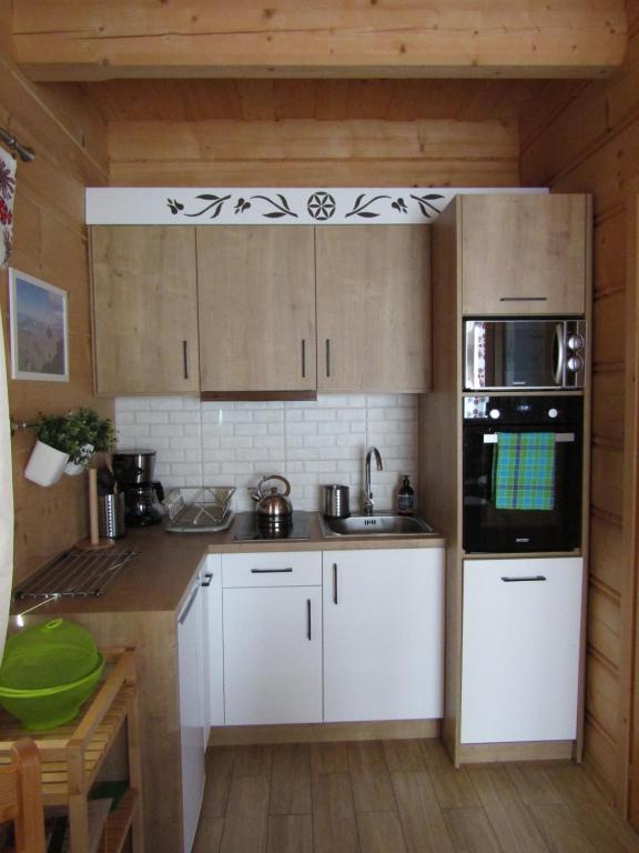Domki Białka & Apartamenty - Two-Bedroom Chalet