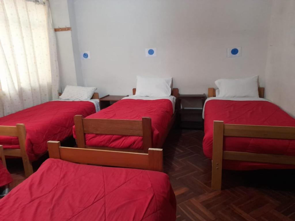 Postel nebo postele na pokoji v ubytování Inka's Rest Hostel