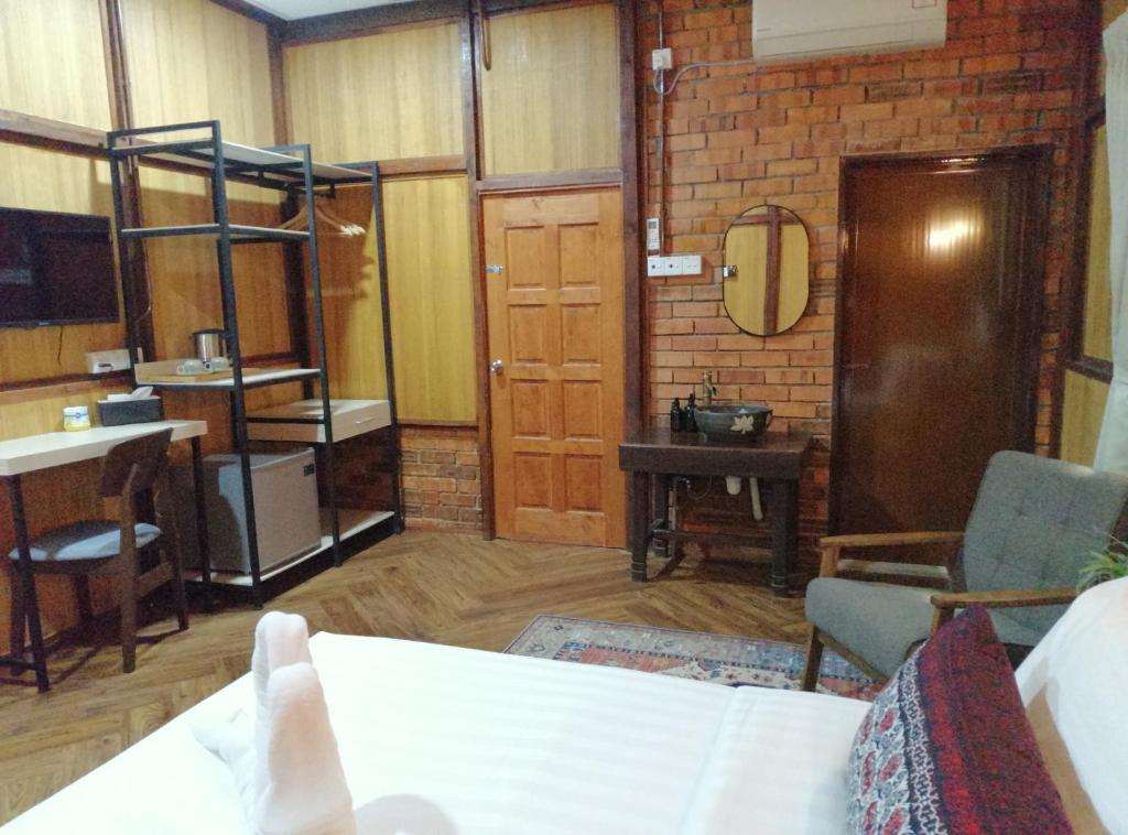 Postel nebo postele na pokoji v ubytování Api-api Eco Chalet