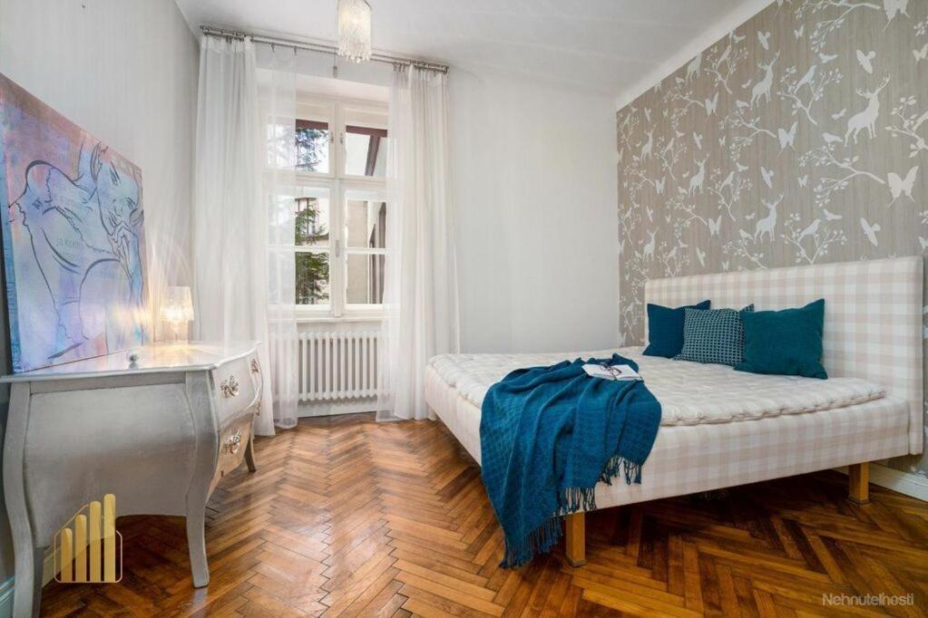 Posteľ alebo postele v izbe v ubytovaní Beautiful appartment in the old town of Bratislava
