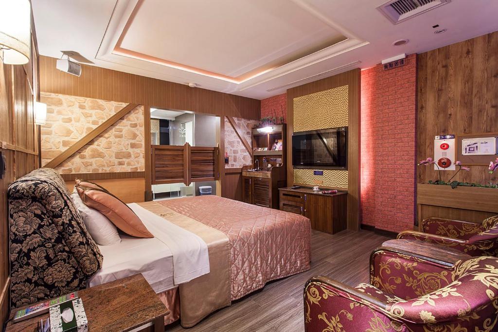 TV a/nebo společenská místnost v ubytování PGS Motel