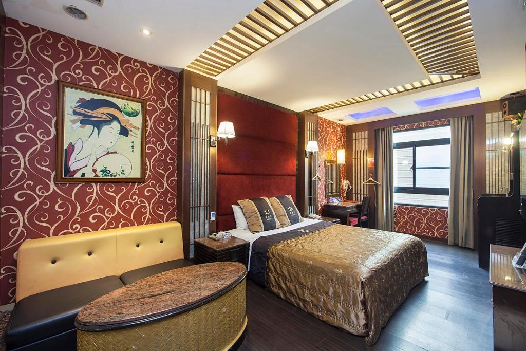 Postel nebo postele na pokoji v ubytování PGS Motel