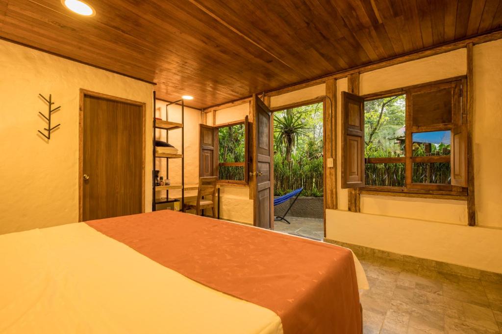 Postelja oz. postelje v sobi nastanitve Ecohotel Piedemonte
