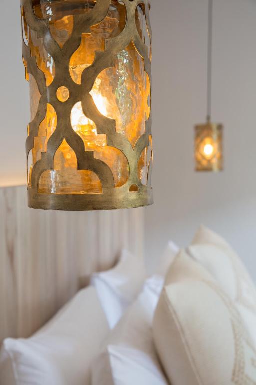 Ein Bett oder Betten in einem Zimmer der Unterkunft Cielo Boutique Hotel & Spa Samui