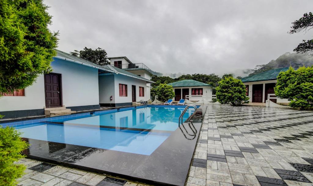 Afbeelding uit fotogalerij van Treebo Trend Misty Garden Resorts With Mountain View in Munnar