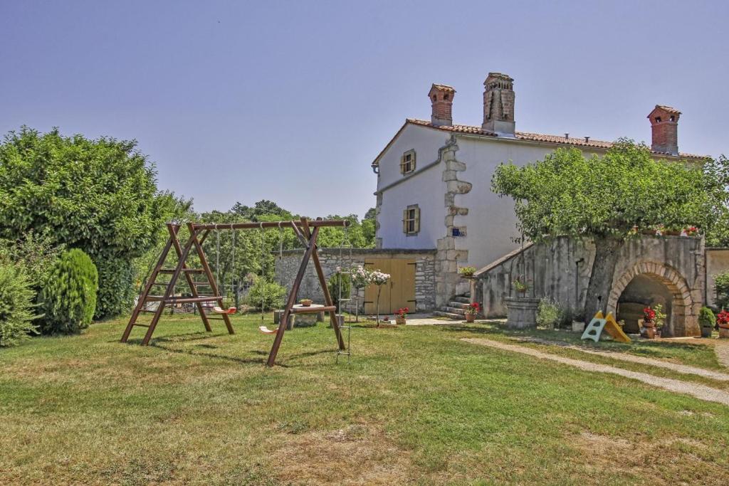 a playground in the yard of a house at Erika in Šumber (Haus für 4-6 Personen) in Nedeščina