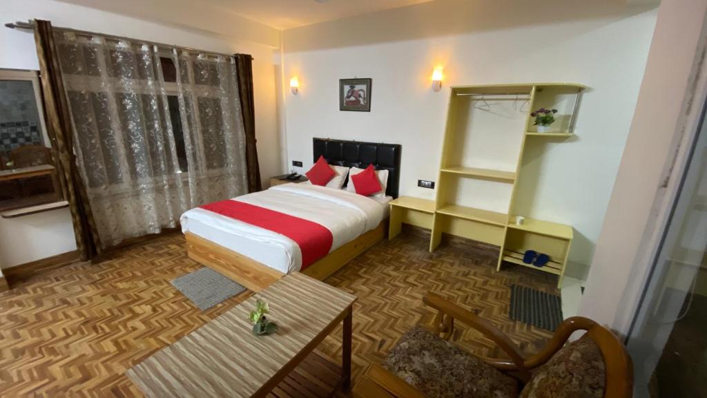 Postel nebo postele na pokoji v ubytování Hidden Gem Residency