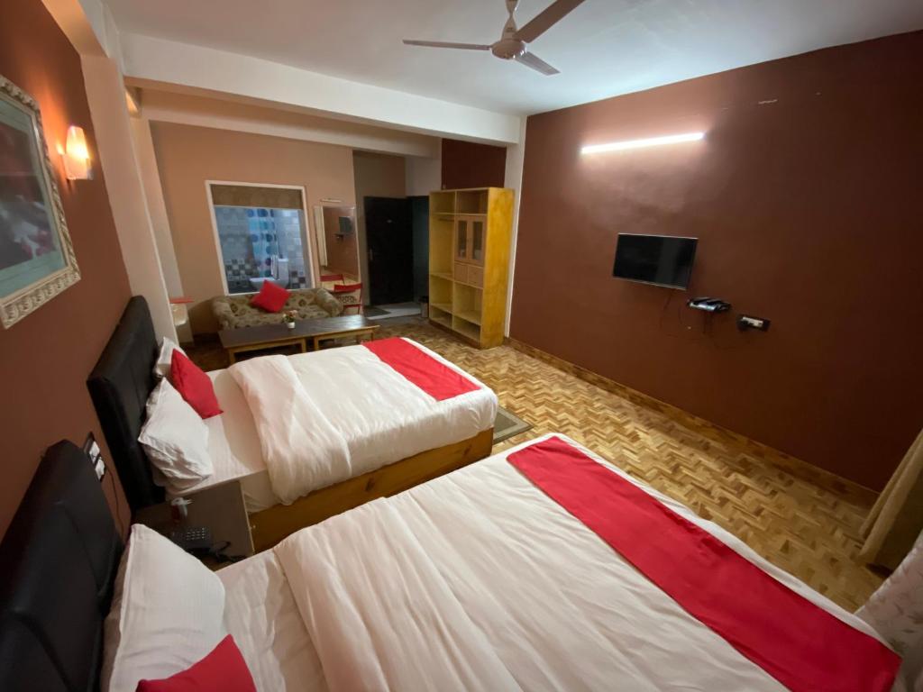 TV a/nebo společenská místnost v ubytování Hidden Gem Residency