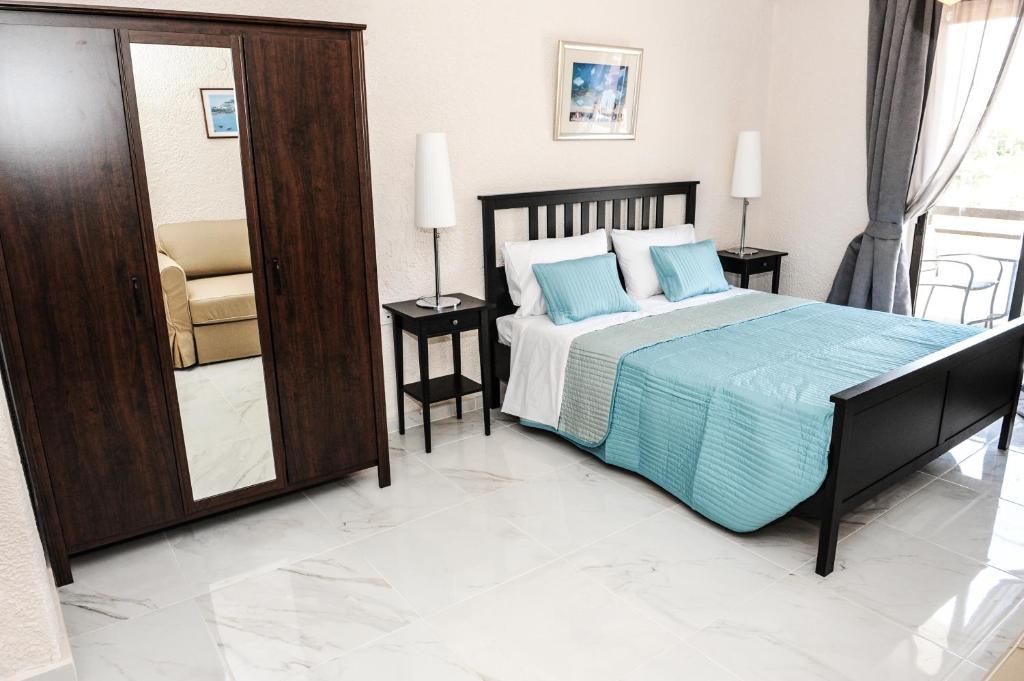Postel nebo postele na pokoji v ubytování Valentino Hotel