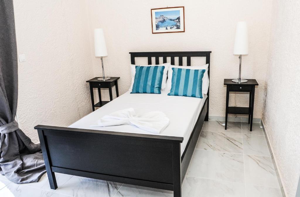 Postel nebo postele na pokoji v ubytování Valentino Hotel
