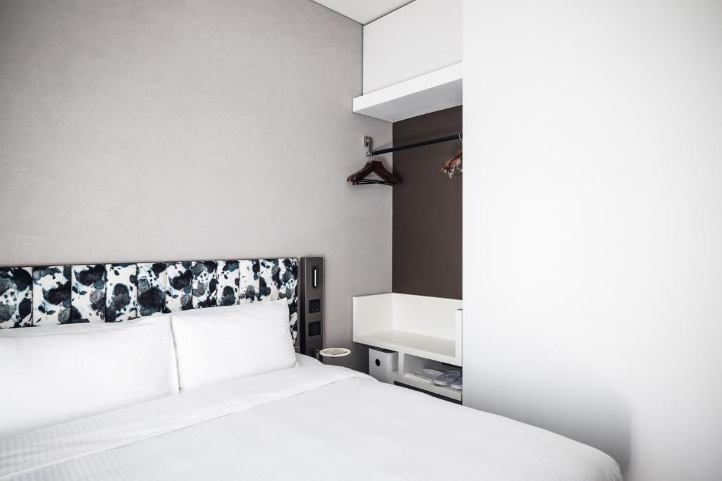 Letto o letti in una camera di Page148, Page Hotels