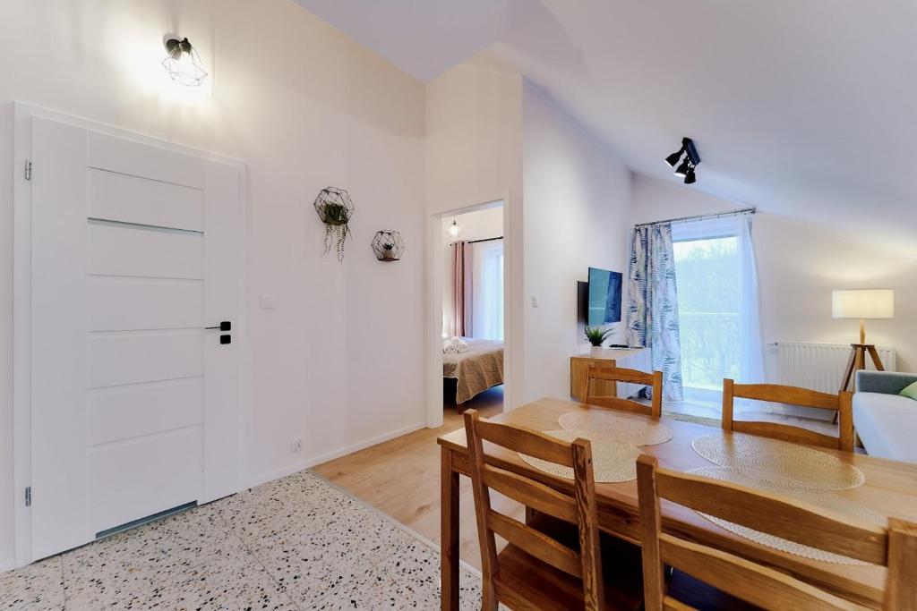 Televízia a/alebo spoločenská miestnosť v ubytovaní LAGUNA Apartament Polanica Residence 54