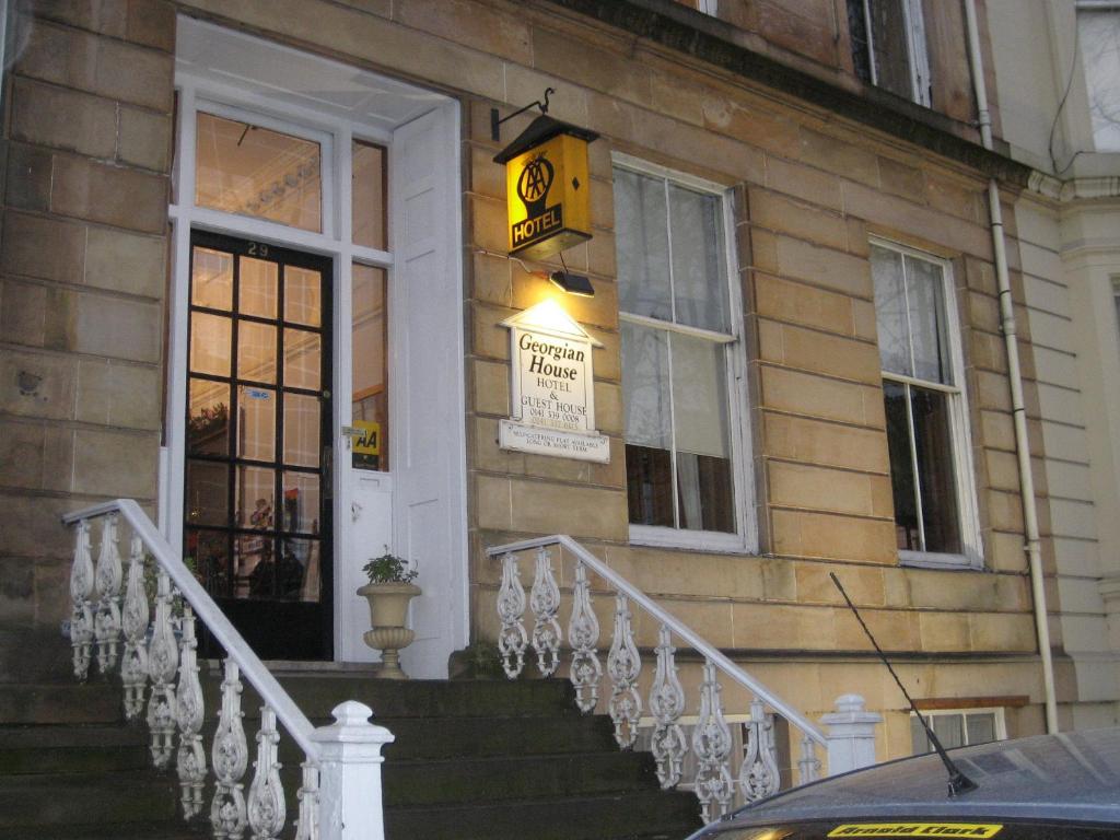 a building with a sign on the front of it at The Georgian House in Glasgow