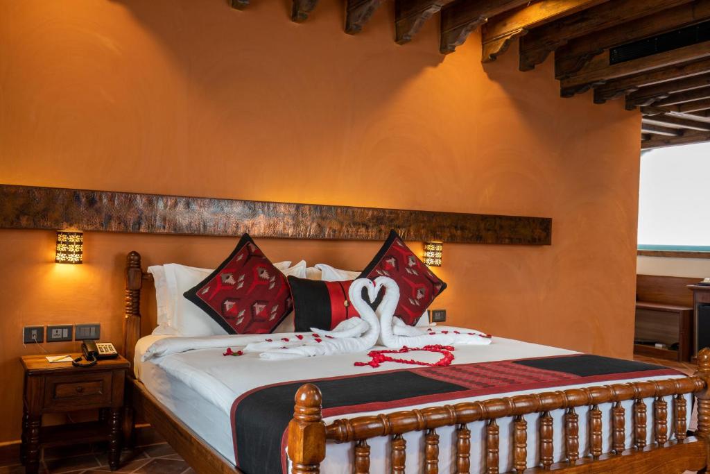 Postel nebo postele na pokoji v ubytování Basera Boutique Hotel