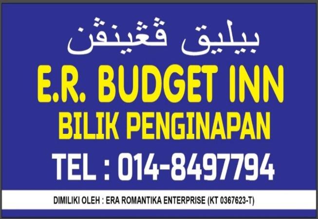 Um cartaz para um pentagrama de uma estalagem económica em E.R. BUDGET INN em Kota Bharu