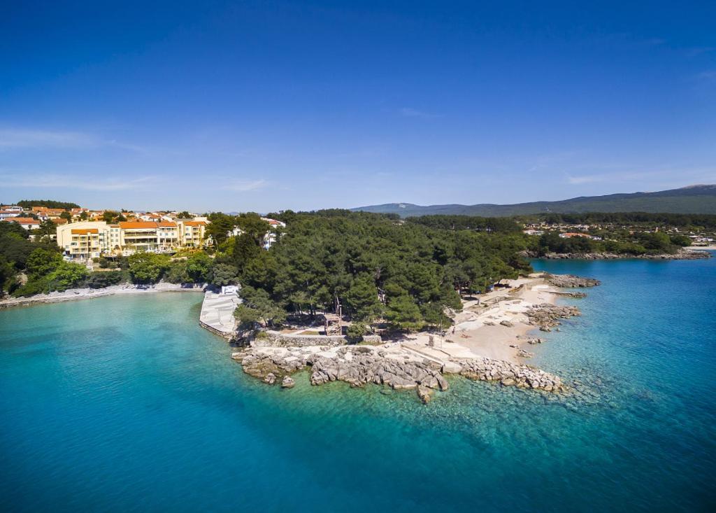 an aerial view of a small island in the water at Krk Sunny Hotel in Krk