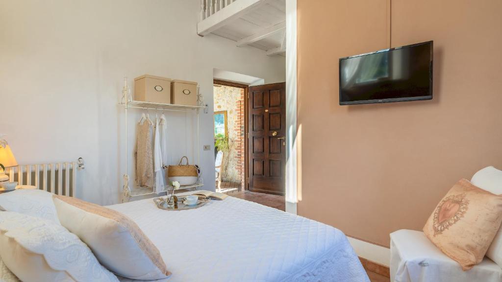 Łóżko lub łóżka w pokoju w obiekcie Villa Beltramonto 14, Emma Villas