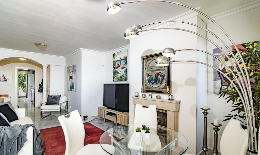 A television and/or entertainment centre at SAA2- comfortable apartment Puerto banus