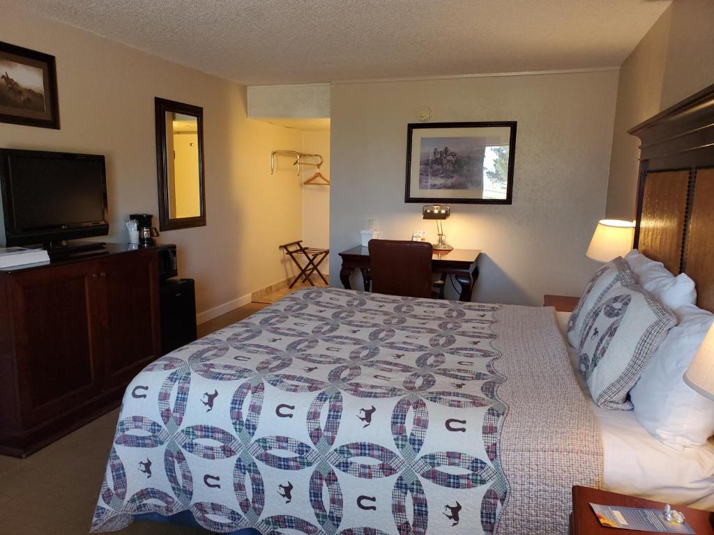 Postel nebo postele na pokoji v ubytování Kansas Country Inn
