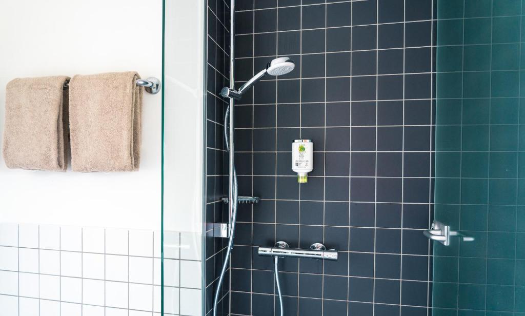 Koupelna v ubytování SLEEEP HOTEL Ansfelden